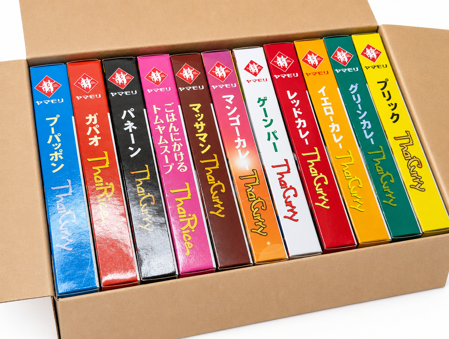 箱に並んだヤマモリのタイカレーとガパオ11個セット